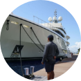 Man looking at yacht